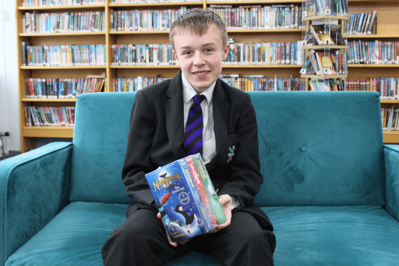 Harry Steps Up to Keep School Library Running Smoothly