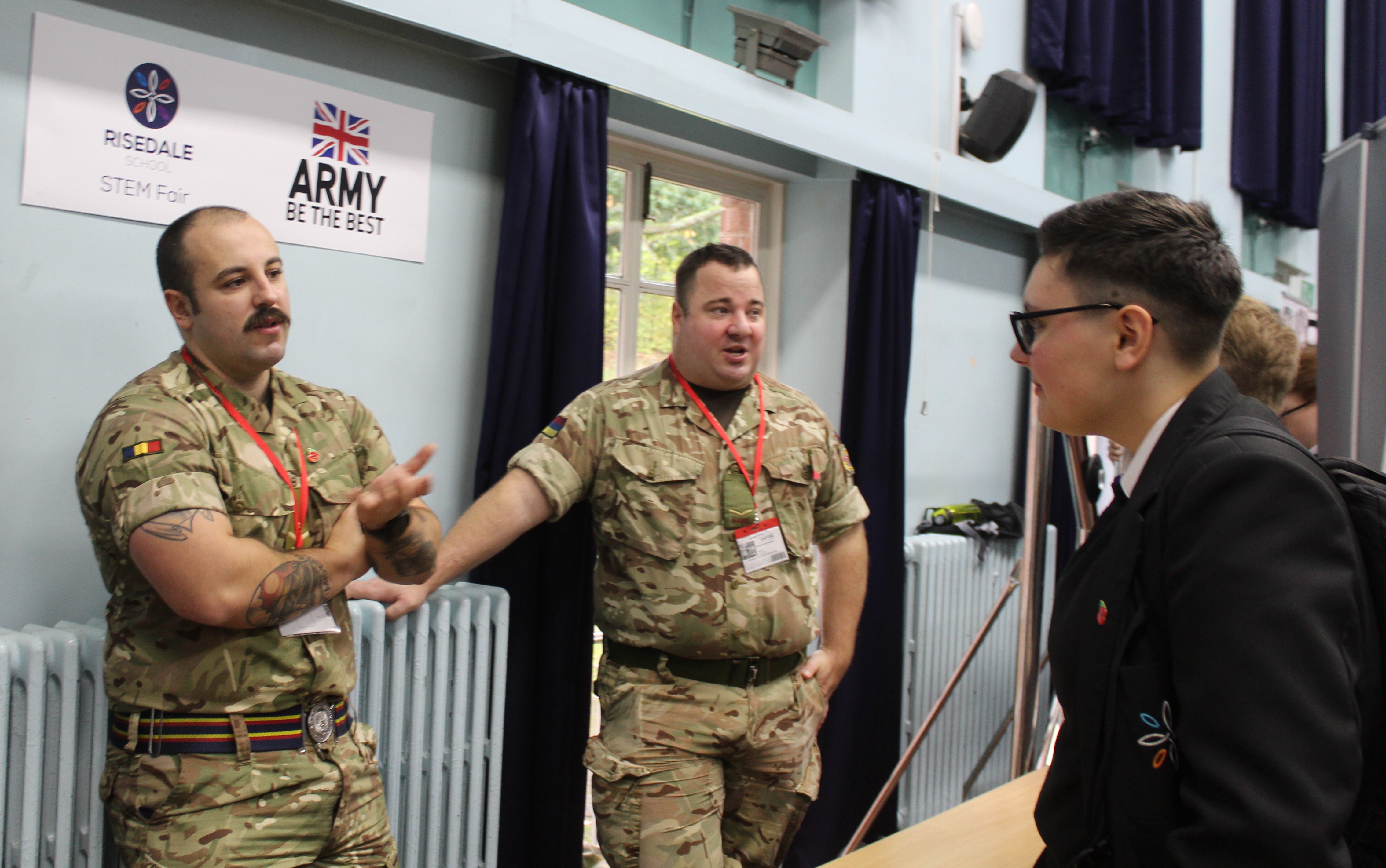 Y8 pupil engaged in conversation learning about STEM careers in the British Army.