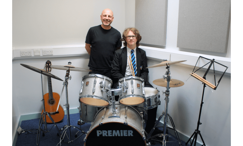 Alex Achieves Distinction in Grade 4 Drum Kit Exam