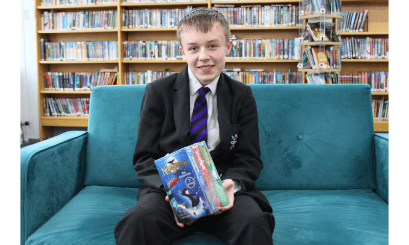 Harry Steps Up to Keep School Library Running Smoothly